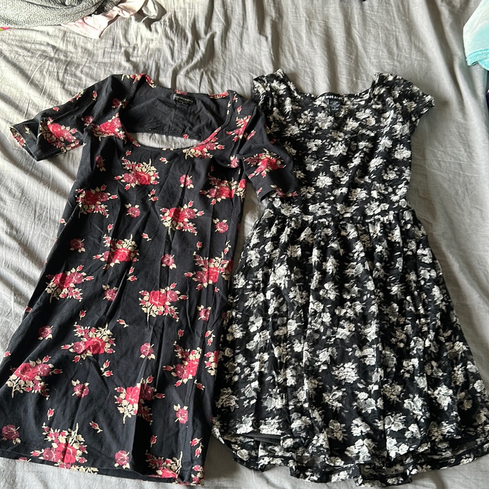 Women’s size small set of two adorable, black floral dresses. Wet seal + Obey